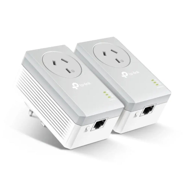 TP-Link AV600 Passthrough Powerline Adapter Kit featuring two white adapters with integrated extra power sockets plugged into a wall.
