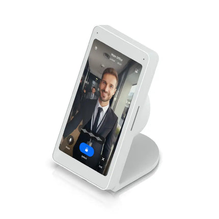 Ubiquiti UACC-Intercom-Viewer-TS table stand deployed on a modern corporate reception desk setup.