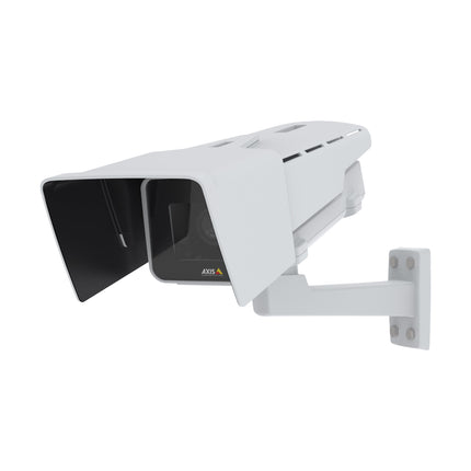 Close-up view of the AXIS P1375-E internal camera module highlighting the replaceable CS-mount varifocal lens and light sensor array