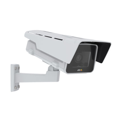 AXIS P1375-E 1080p box camera mounted on an exterior industrial facility wall providing long-range perimeter monitoring with electronic image stabilization