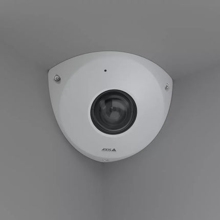 Detailed view of the AXIS P9117-PV lens and built-in microphone, highlighting its 360-degree coverage and AI-powered audio event detection.