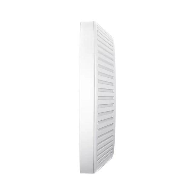 The TP-Link EAP613 AX1800 Wi-Fi 6 access point mounted seamlessly onto an office ceiling for business wireless networking.