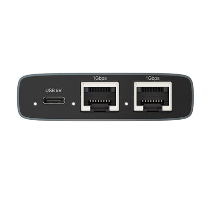 Close-up of the TP-Link EH310 metal Ethernet splitter showcasing the warm white LED network activity and power indicator lights.