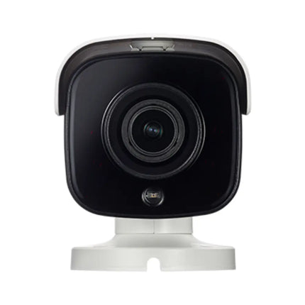The IDIS DC-T4831HRX vandal-resistant security camera mounted on an outdoor building perimeter showing its structural 3-axis mechanical mounting arm.