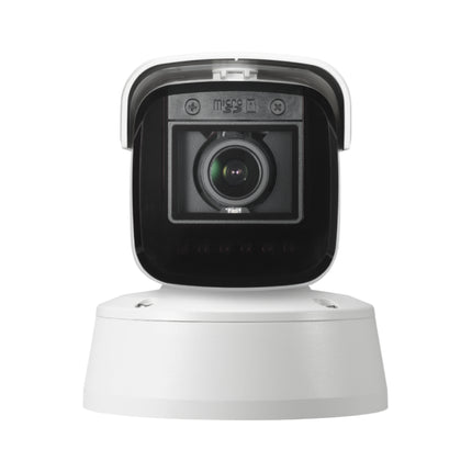 Side angle profile view of the IDIS DC-T6631WRA network security camera mounted outdoors on a commercial building wall.