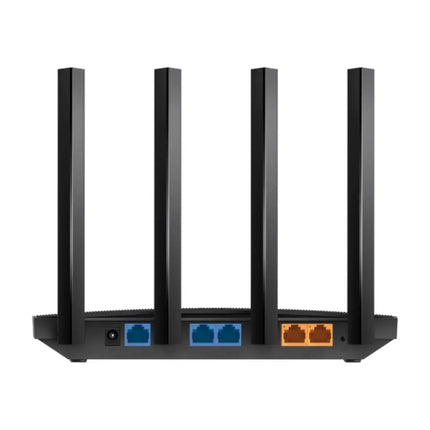An Omada ER605W VPN router deployed on a small business office desk, symbolizing secure multi-site connectivity and centralized cloud management via the Omada app.