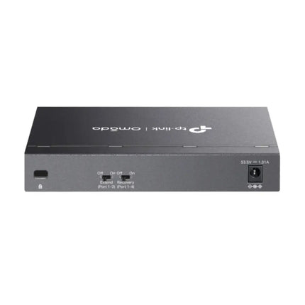 Close-up front panel view of the TP-Link DS106GPP switch showing 4 PoE++ ports, 2 gigabit uplinks, and hardware toggles for Priority and PoE Auto Recovery.