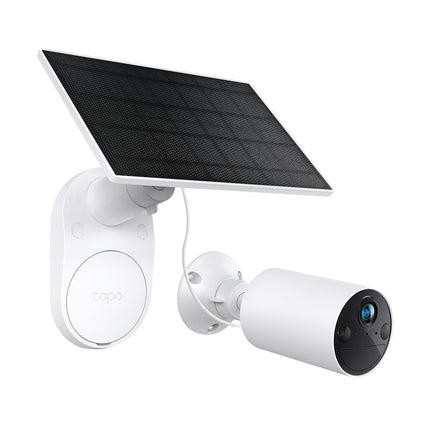The Tapo TC82 wire-free outdoor camera and solar panel mounted on a house fence line for 24/7 sustainable home security.