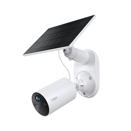 Unboxed components of the Tapo TC82 KIT showing the outdoor smart camera, companion solar panel, adjustable brackets, and mounting hardware.