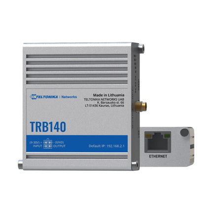 Front view of the compact grey aluminum Teltonika TRB140 industrial 4G LTE IoT gateway showing its LAN connection status and mobile signal strength LEDs.