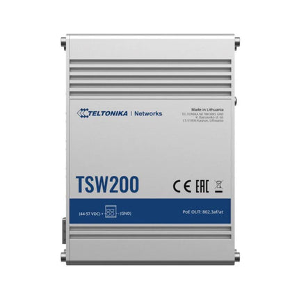 Front isometric view of the rugged Teltonika TSW200 industrial unmanaged PoE switch showing its durable silver anodized aluminum housing.