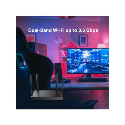 The TP-Link Archer BE220 Wi-Fi 7 router positioned on a home office desk, delivering high-speed internet for 4K streaming and low-latency online gaming.