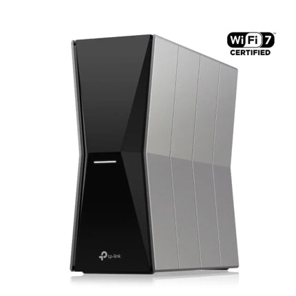 Front angle view of the black TP-Link Archer BE805 BE19000 tri-band Wi-Fi 7 router showing its modern, vertical monolithic chassis with internal antennas.