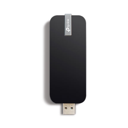 TP-Link Archer T4U AC1300 dual band USB Wi-Fi adapter in black with sleek compact body.