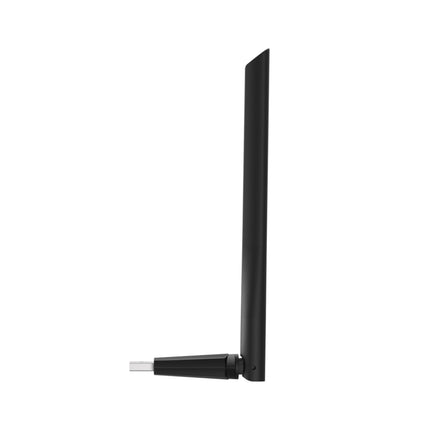 The TP-Link Archer TBE400U Plus Wi-Fi 7 USB dongle plugged directly into the USB port of a modern computer chassis.
