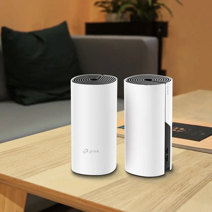 Graphic displaying TP-Link Deco M4 AC1200 high-speed mesh router connecting up to 100 devices without lag.