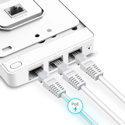 Slim and low-profile Omada EAP615-Wall plate access point mounted flush against a wall for seamless room integration.