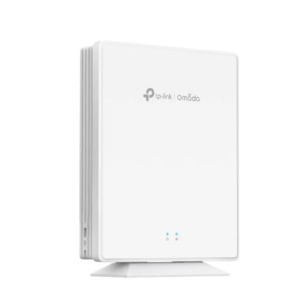 The TP-Link Omada EAP650-Desktop AX3000 wireless access point seamlessly blending into a modern office meeting room setup, delivering high-speed business Wi-Fi.