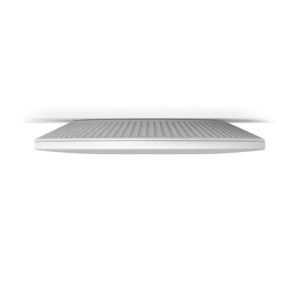 Side profile view of the slim TP-Link Omada EAP660 HD AX3600 access point, showing the low-profile ceiling mounting chassis.