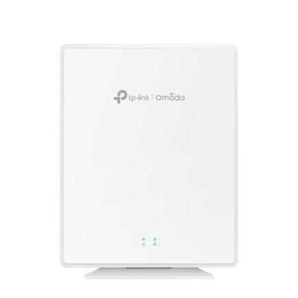 Angled front view of the compact, white TP-Link Omada EAP650-Desktop AX3000 Wi-Fi 6 access point sitting on a clean office desk.