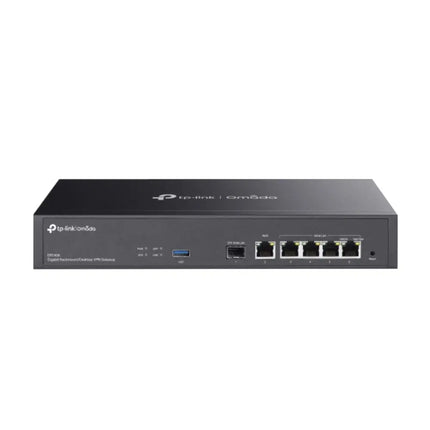 TP-Link Omada ER7406 enterprise wired Gigabit VPN router featuring a durable dark gray rackmount metal chassis with front-facing ports and status LEDs.