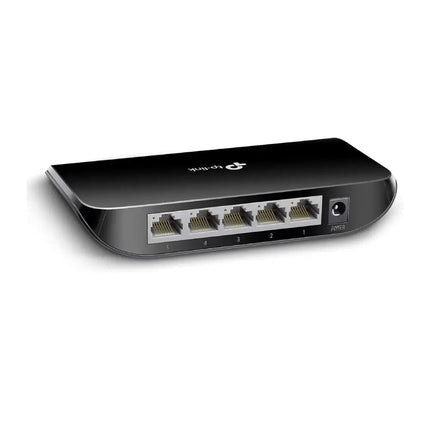 Rear view of the TP-Link 5-port gigabit switch showing the five RJ45 ethernet ports and the DC power input jack.