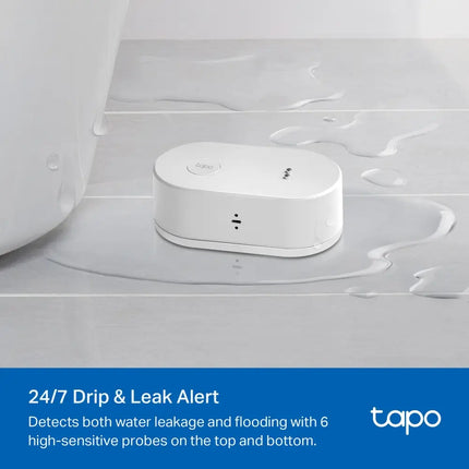 A smartphone displaying a real-time water leak alert from the TP-Link Tapo smart home app.