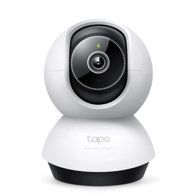 Front view of the white TP-Link Tapo TC74 indoor pan and tilt AI home security Wi-Fi camera sitting on a tabletop surface.