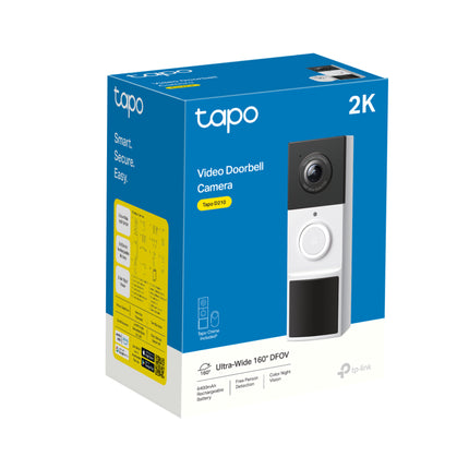 Wire-free Tapo TD21 smart video doorbell mounted cleanly next to a residential front door using the included positioning wedge.