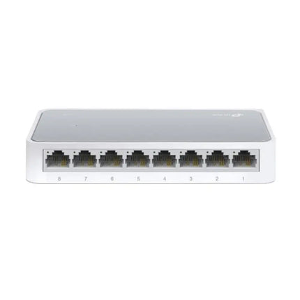 An isometric view of the compact white TP-Link TL-SF1008D 8-port Fast Ethernet desktop switch, highlighting its modern plastic casing and top-facing LED indicators.