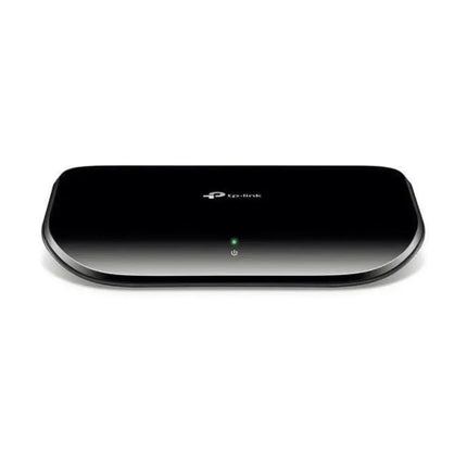 TL-SG1005D 5-port gigabit desktop switch in a black plastic housing featuring green LED status indicator lights on the front panel.