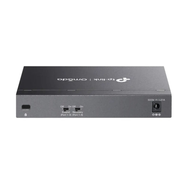 Close-up view of the physical hardware DIP switches on the TP-Link TL-SG1006PP switch, showcasing toggles for Extend Mode transmission up to 250m and PoE Auto Recovery.
