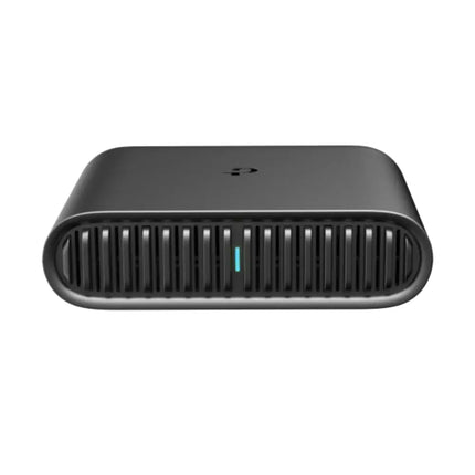 Front view of the compact, white TP-Link TL-WR1502X Wi-Fi 6 travel router featuring a sleek, pocket-sized design with status LED lights.