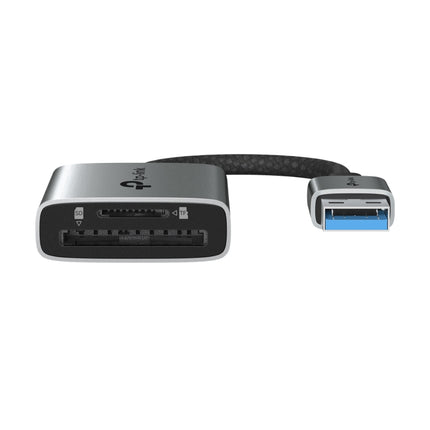 The ultra-portable TP-Link UA430 USB card reader plugged into a laptop port, ideal for photographers and content creators on the go.