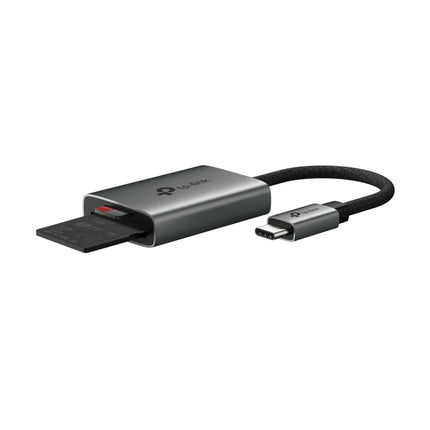 Close-up of the compact TP-Link UA430C premium aluminum card reader with an integrated short flexible cable.