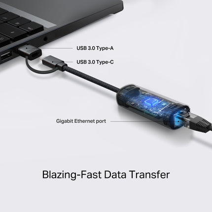 Close-up of the RJ45 port on the TP-Link UE310C adapter, highlighting the high-speed Gigabit Ethernet connection capability.