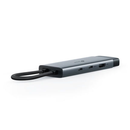 Side angle of the UH6120C hub highlighting the 4K HDMI video output port and the USB-C Power Delivery charging passthrough port.