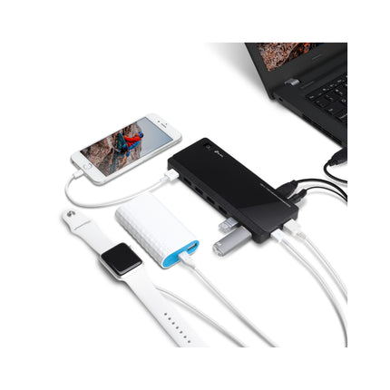 TP-Link UH720 powered USB 3.0 hub connected to desktop PC charging mobile devices while transferring data.