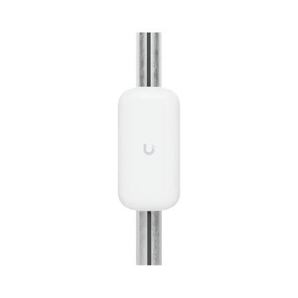Ubiquiti fiber strain relief kit showing internal detachable cable management reel.