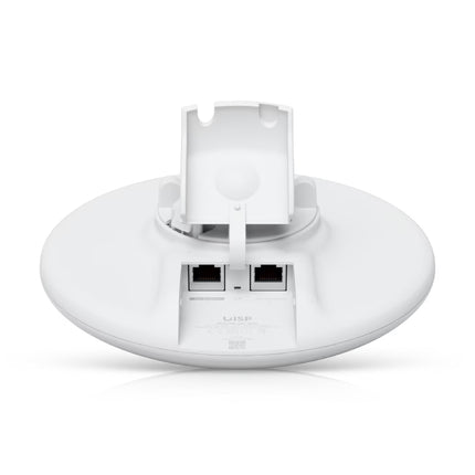 An outdoor Ubiquiti NanoBeam 5GHz airMAX CPE wireless bridge unit securely mounted to a metal structural pole on a building rooftop.