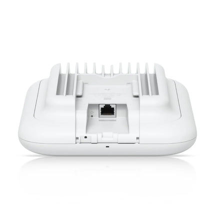 Bottom detail view of the UniFi U7 Outdoor access point showing the weatherproof cable gland open to reveal the 2.5 GbE PoE+ input port.