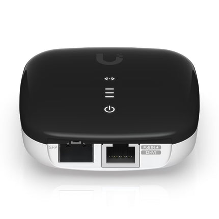 Ubiquiti UACC-AE outdoor Ethernet repeater mounted on an exterior pole for extended network deployment