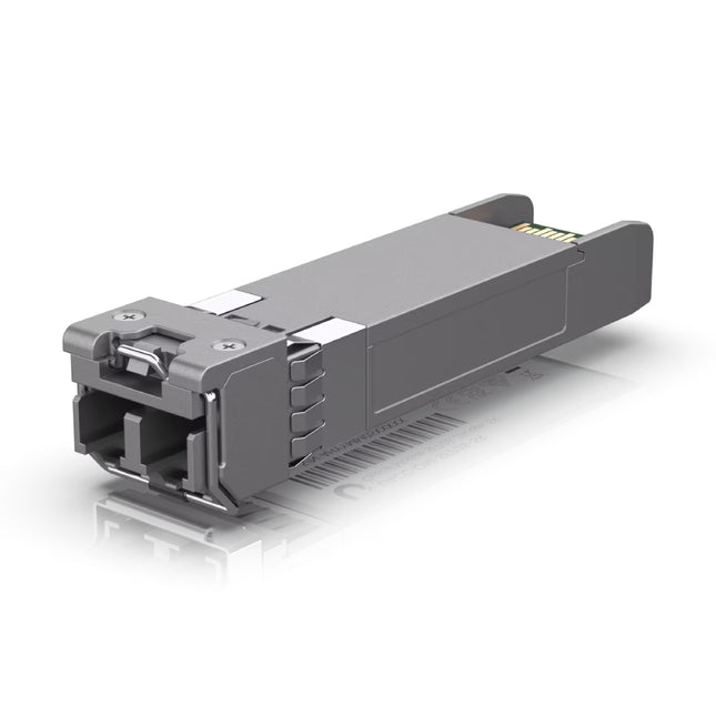 Ubiquiti UACC-OM-SFP28-SR optical module inserted into an SFP28 port on a UniFi Enterprise Switch