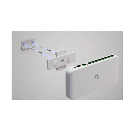 Ubiquiti UACC-Switch-DIN mounted inside a commercial telecom enclosure with a UniFi compact switch.