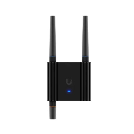 Ubiquiti UMR-Ultra ultra-compact LTE mobile router front operational view showing external antennas and status LED.