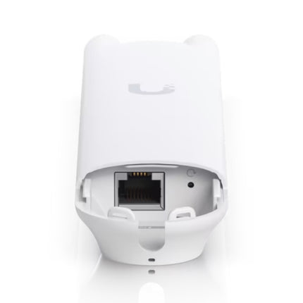 Ubiquiti UniFi AC Mesh retail box packaging showing the access point unit, dual antennas, wall mount accessories, and a 24V Gigabit PoE adapter.