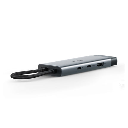 Top and side angles of the TP-Link UH7020C hub displaying its 4K HDMI port, SD/microSD slots, USB-C data port, and dual USB-A ports.