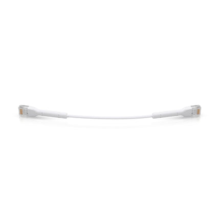 Neatly coiled 2-2m white UniFi ultra-flexible Cat6 ethernet patch lead.