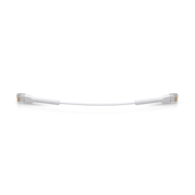 Neatly coiled 2-2m white UniFi ultra-flexible Cat6 ethernet patch lead.