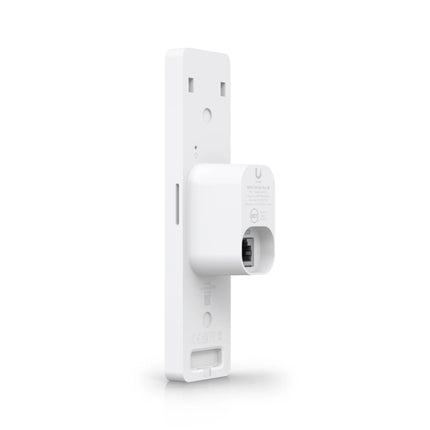 Side angle view of the UniFi Access G3 Reader Pro mounted flat against a modern glass and aluminum office door frame, highlighting its slim architectural profile.
